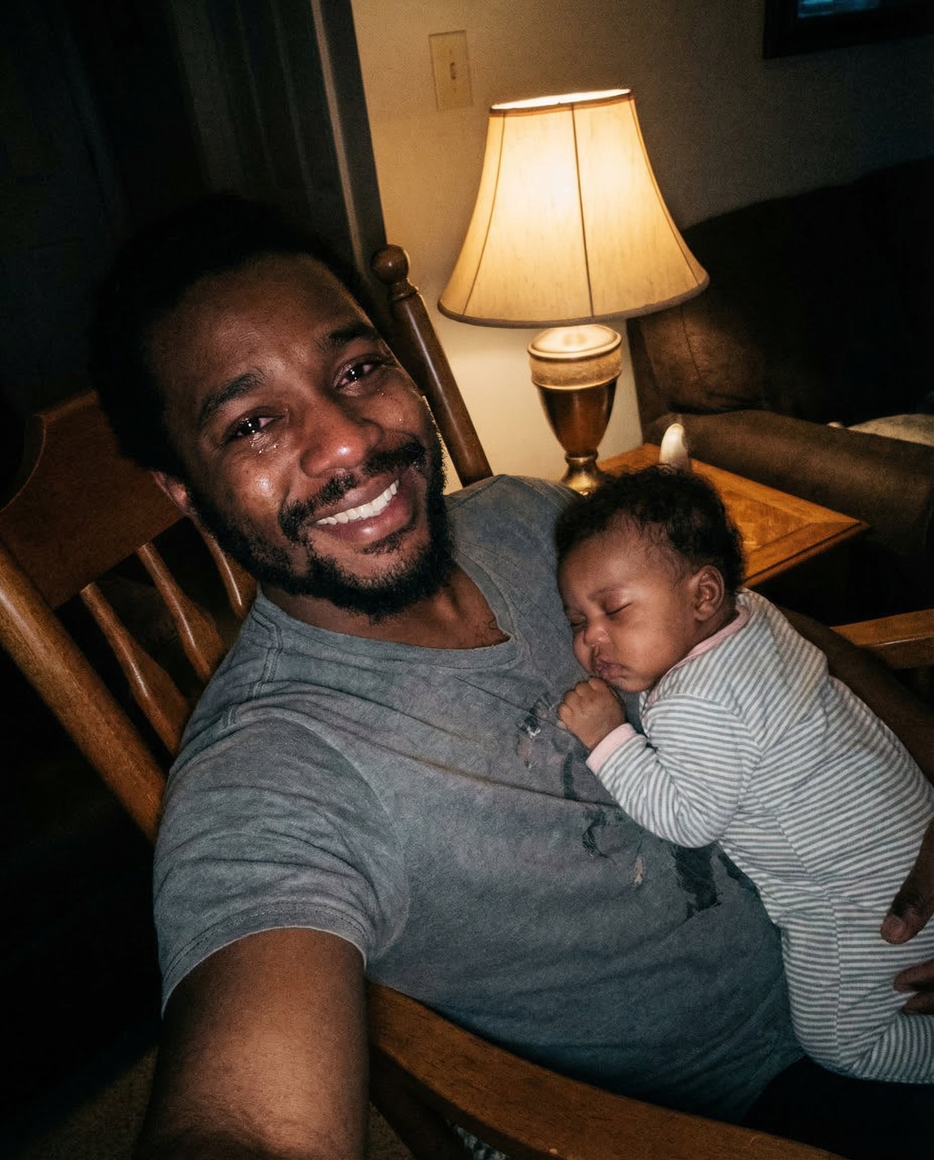 Dad with sleeping baby