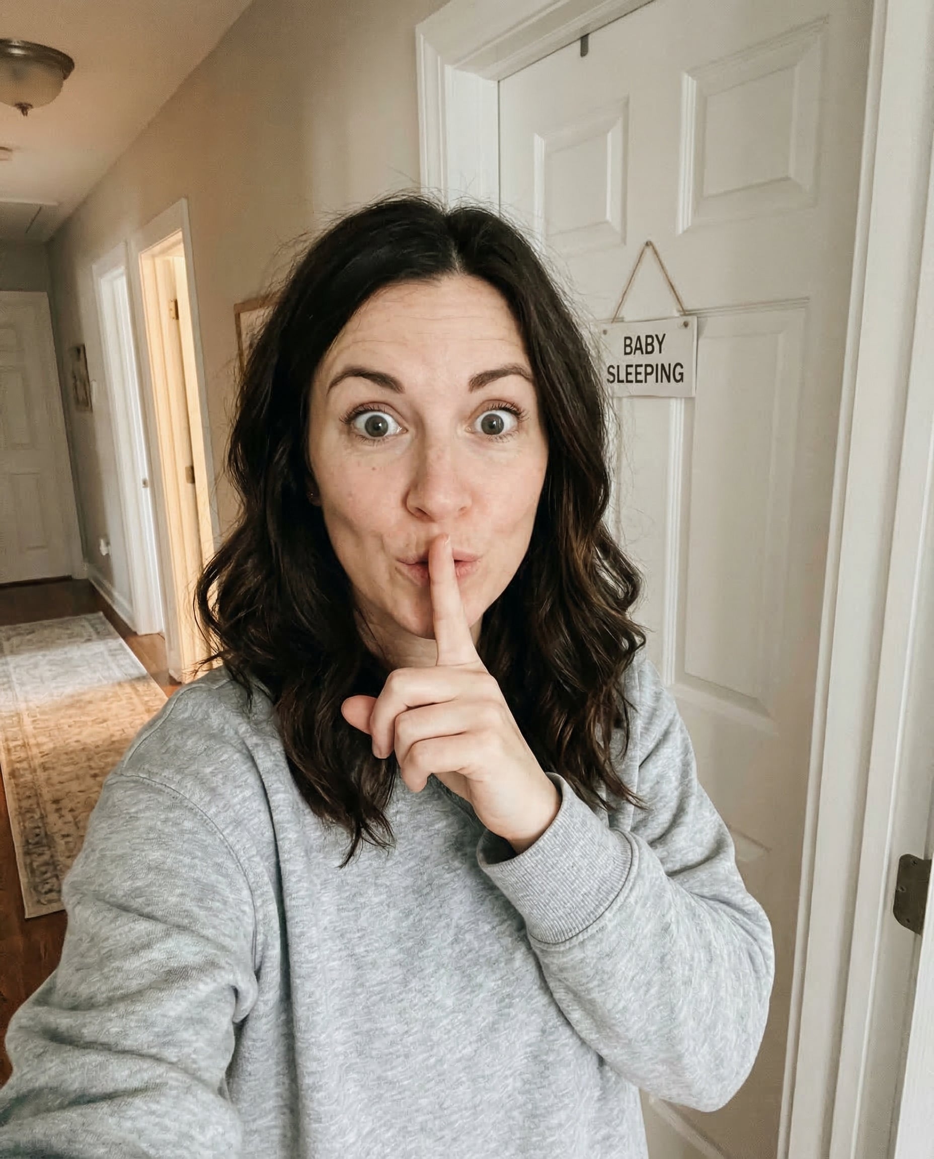 Mom happy outside nursery