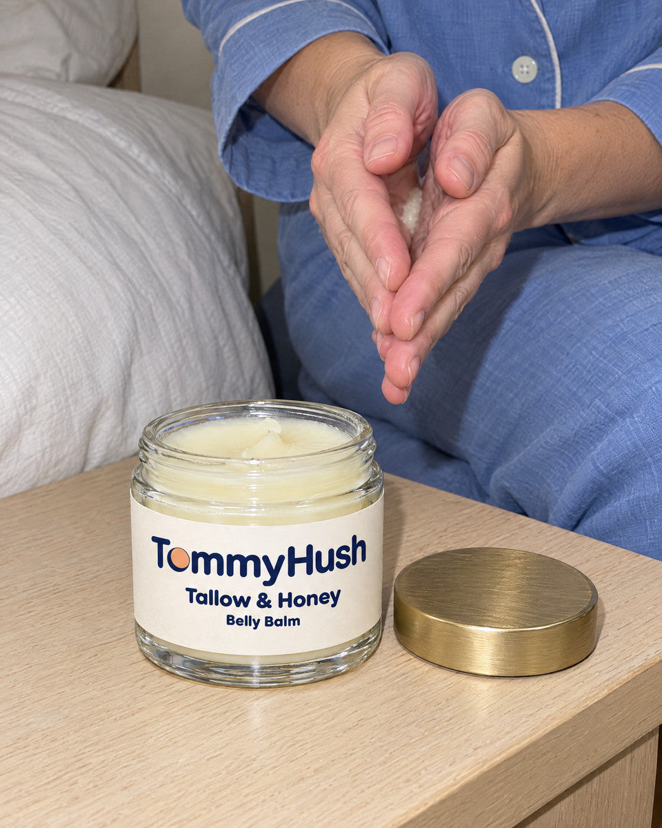 TummyHush Tallow & Honey Belly Balm balm warmed between palms